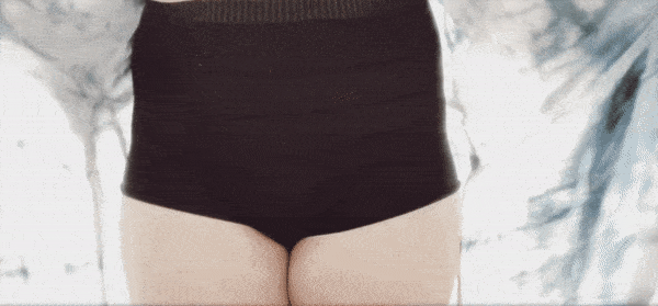 woman wearing postpartum black underwear